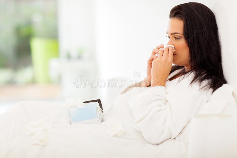 Lit malade de femme photo stock Lit malade de femme photo stock