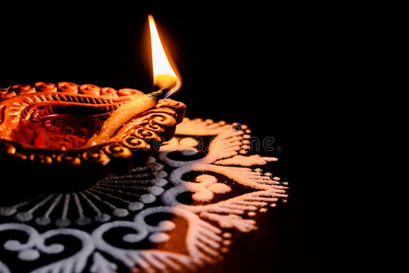 A Lit Terracotta Lamp or Clay Diya Placed on Black Background. Festival of  Lights or Deepawali Concept Stock Image - Image of indian, copy: 169146479