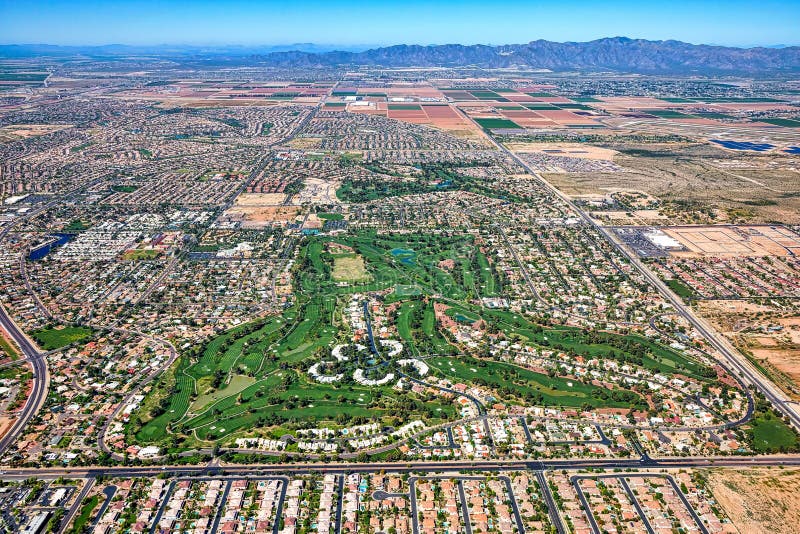 Litchfield Park Park, Arizona aerial view looking west with the White Tank Mountains in the distance. Litchfield Park Park, Arizona aerial view looking west with the White Tank Mountains in the distance