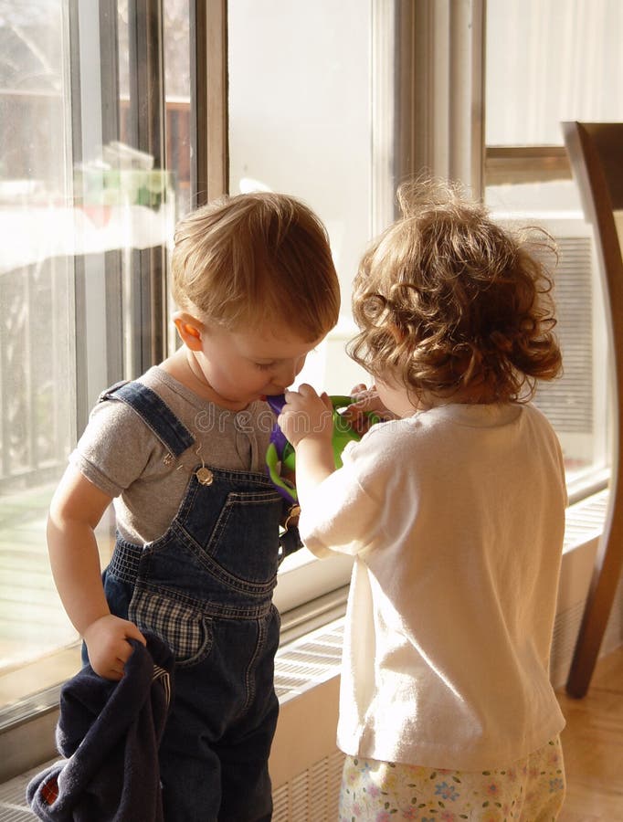 Litle girl helps his friend