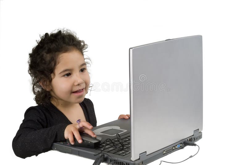 Littel girl with laptop computer royalty free stock image
