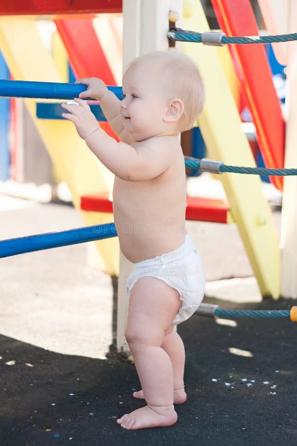 Littele baby play on playground