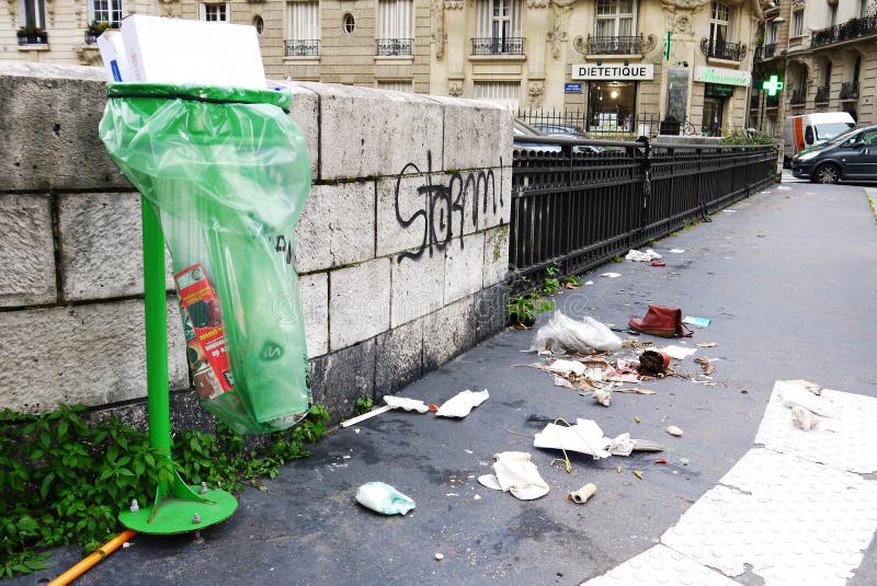 littered-street-paris-near-trash-disposal-bag-th-arrondissement-france-53915568.jpg