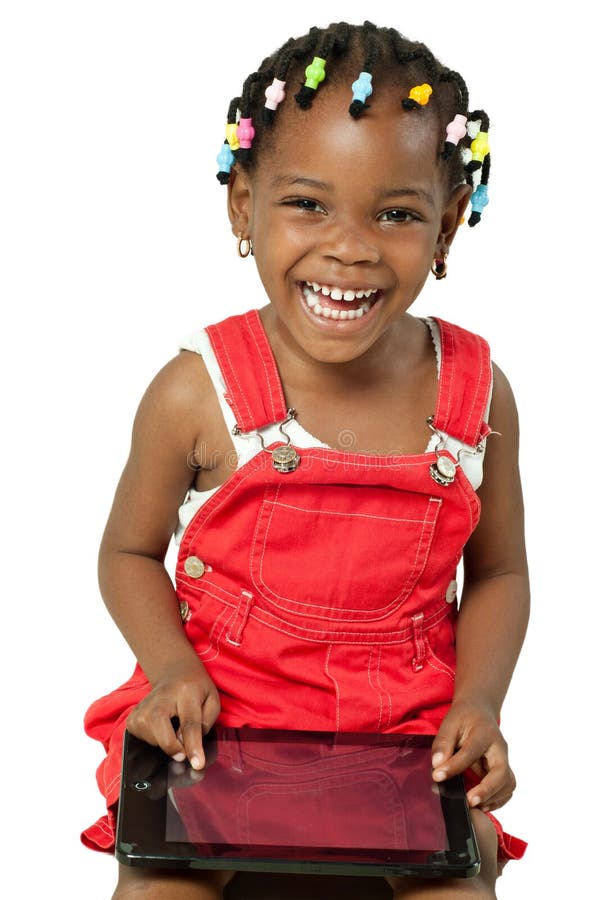 Little african american girl using tablet pc royalty free stock photo