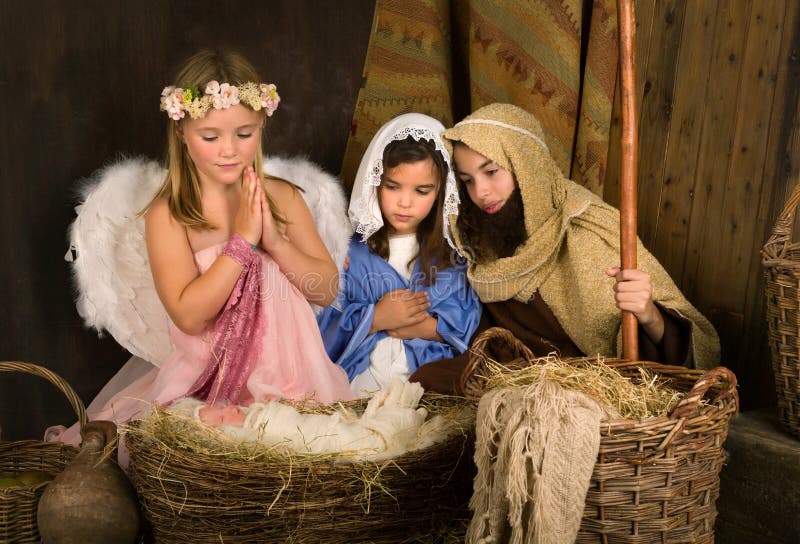 Little angel in nativity scene