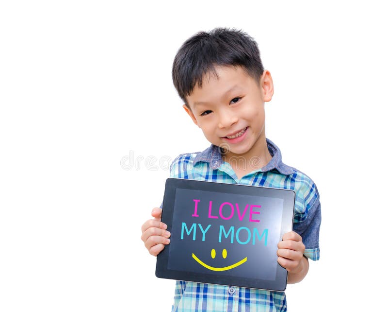 Little asian boy smiles with tablet computer on white background