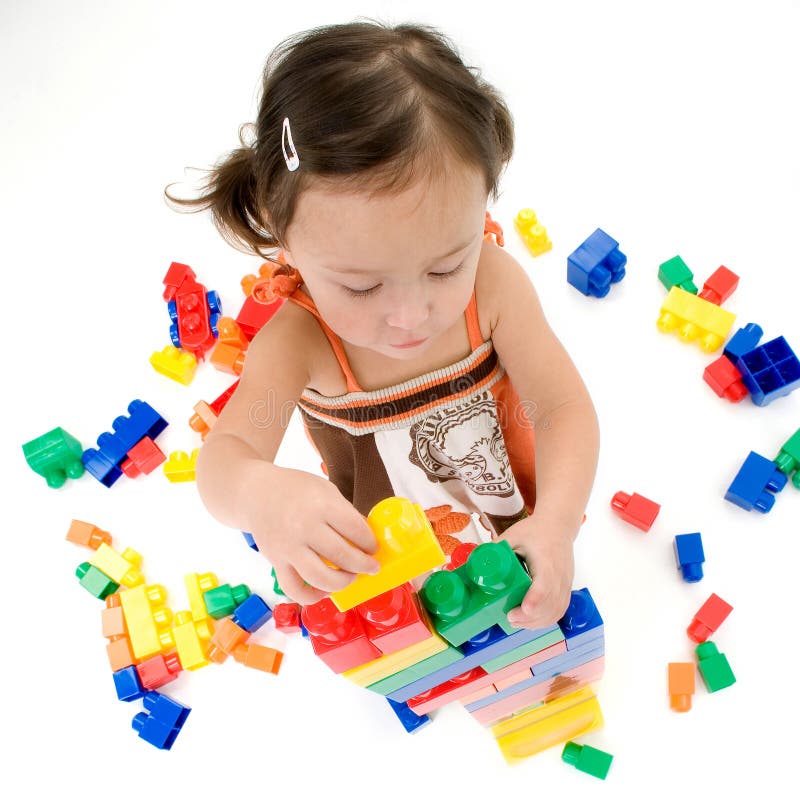 Little Asian girl with blocks