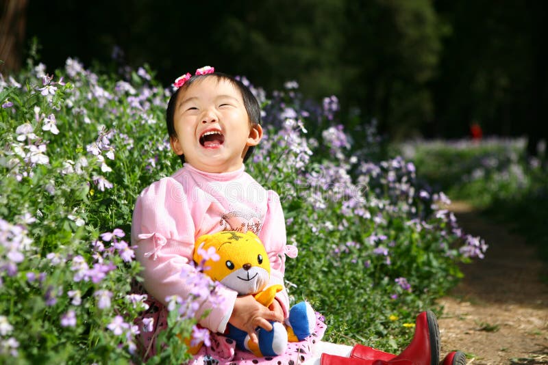 Little asian girl is laughing