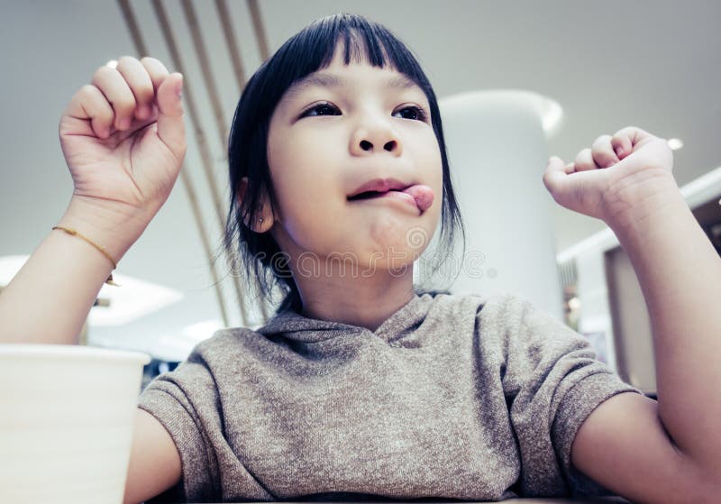 Young Girl Licking