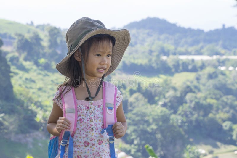 Little Asian Kids Hiking Mountain. Child Mountaineer Having Fun while  Climbing a Mountain with a Backpack Stock Image - Image of nature, foggy:  265758263