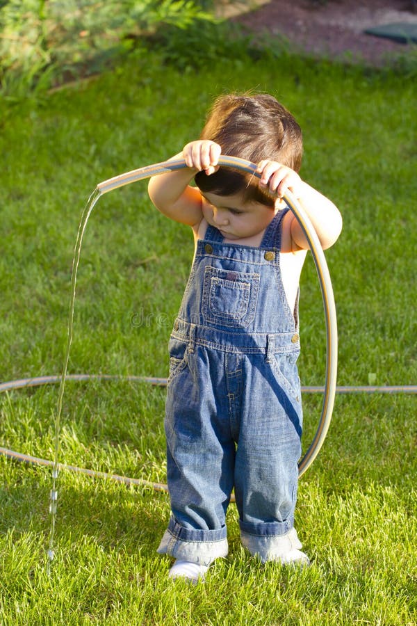 Little baby boy gardener stock image Little baby boy gardener stock image