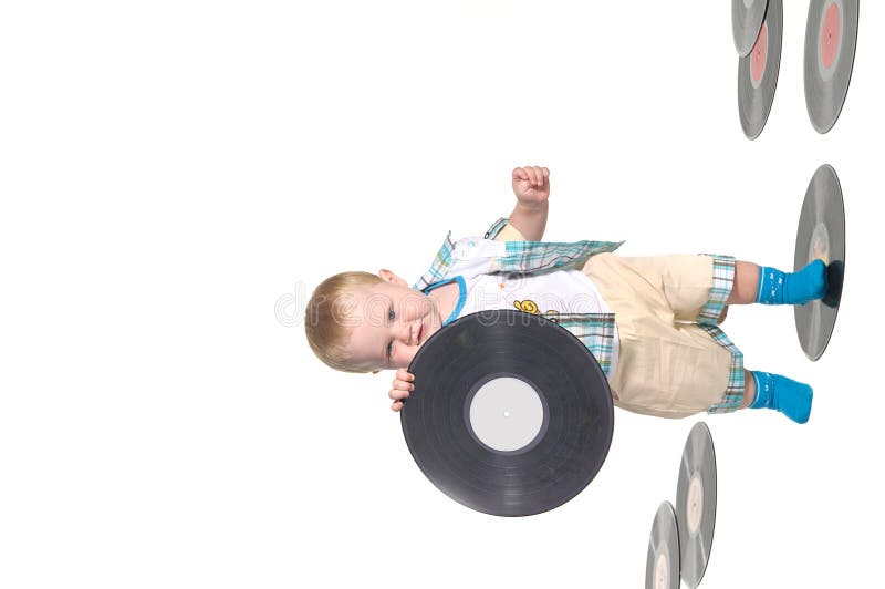 Little baby boy holding a vinyl disk