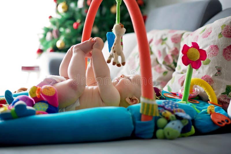 Little Baby Boy, Playing with Colorful Toys at Home Stock Photo Image