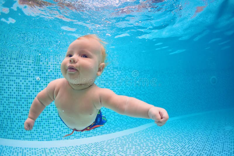 Little Baby Dive Underwater With Fun In Swimming Pool ...