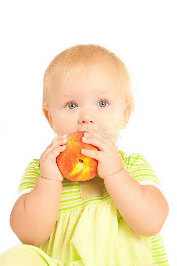 Little Baby Eat Red Peach Picture. Image 16964665