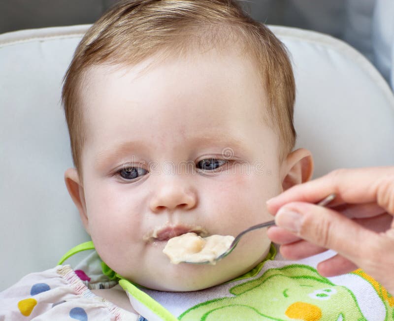 Little Baby Girl Feeding With A Spoon Stock Photo Image Of Hun