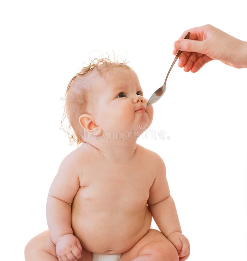 Little baby-girl spoon and parent s hand