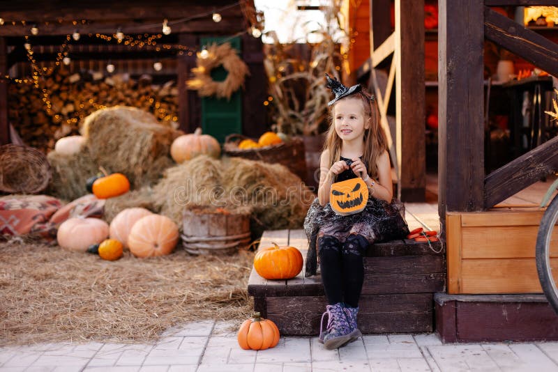 https://thumbs.dreamstime.com/b/little-beautiful-cute-girl-witch-dress-celebrate-halloween-fun-child-masquerade-terrace-house-party-decoration-197817240.jpg