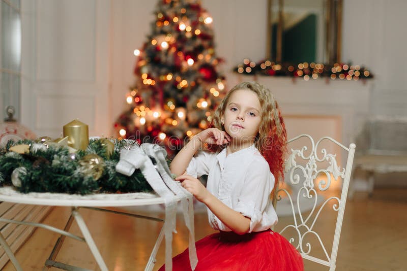Little Beautiful Girl on the Background of a Decorated Christmas Tree ...