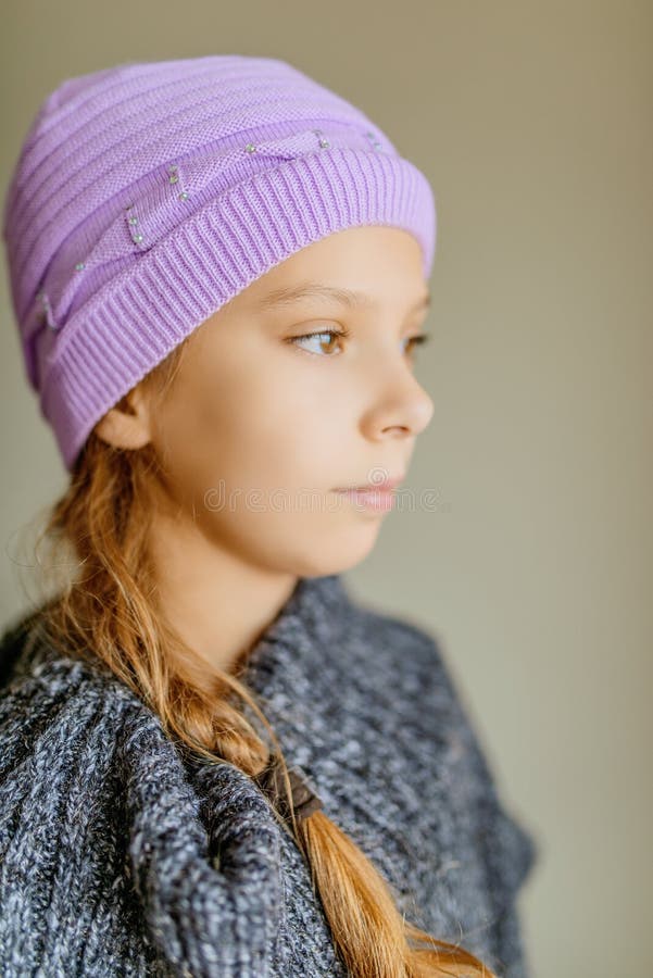 Little beautiful girl in winter hat stock image