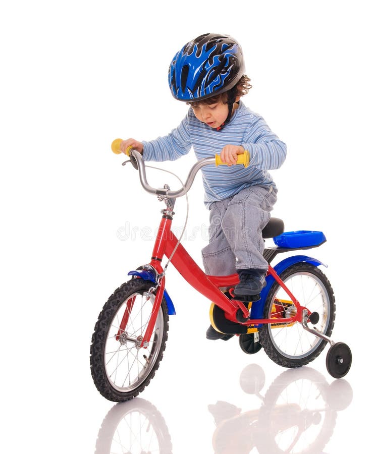 Little boy riding bicycle on white. Little boy riding bicycle on white