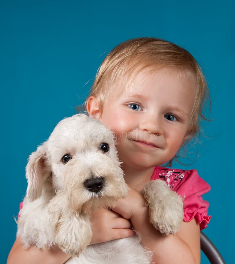 Little Blond Girl and Her Puppy Stock Image - Image of schnauzer ...