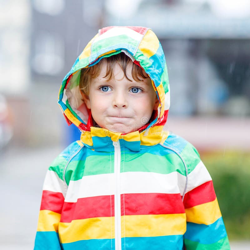 Little Blond Kid Boy Walking with Big Umbrella Outdoors Stock Photo ...