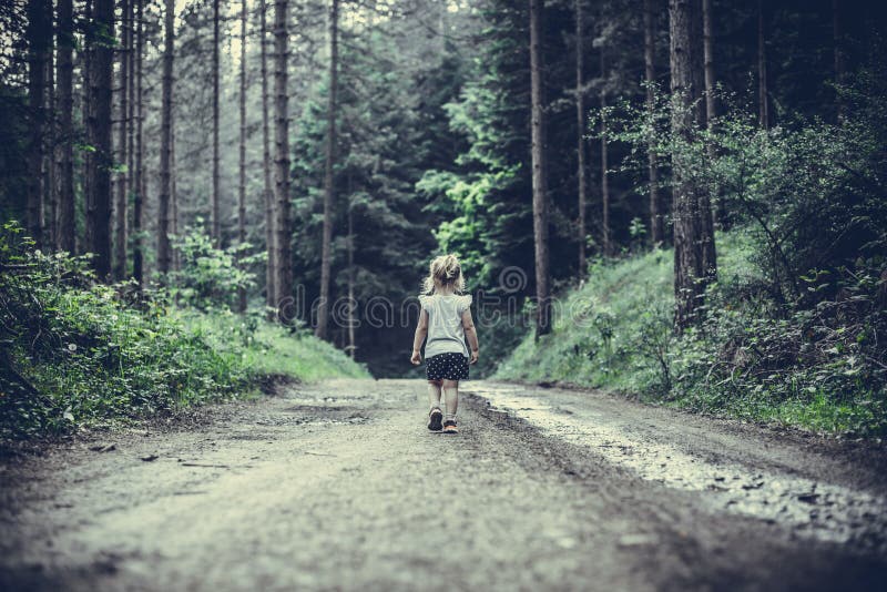 Little Girl Lost in Forest Walking Alone