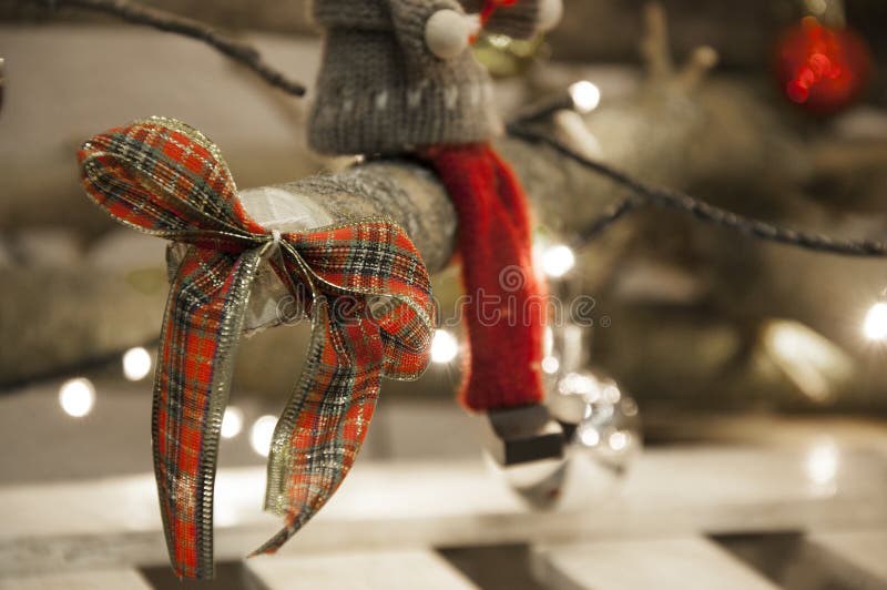 Little Bow on a Christmas Tree. Garlands Decorations and Toys