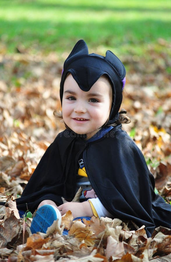 Little boy in autumn park