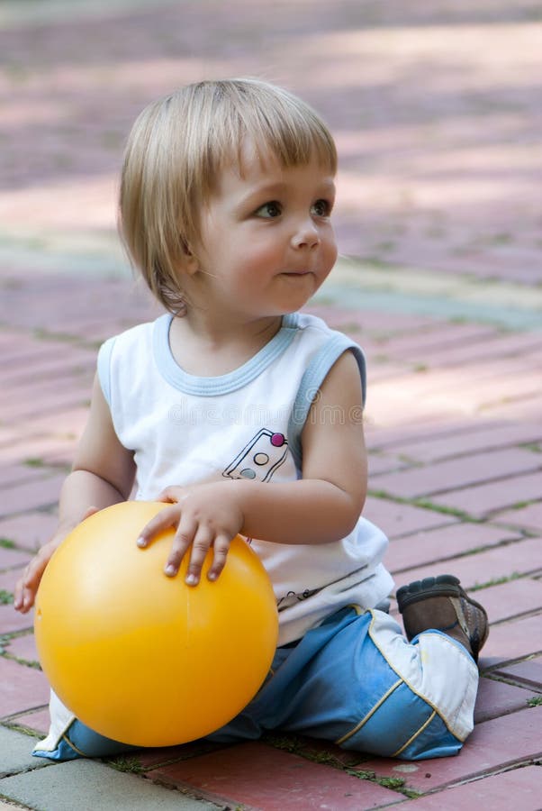 The Little Boy with a Ball in Hands Stock Photo Image of adorable