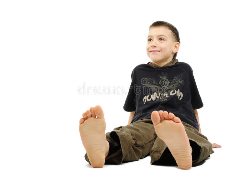 Little boy barefoot, isolated on