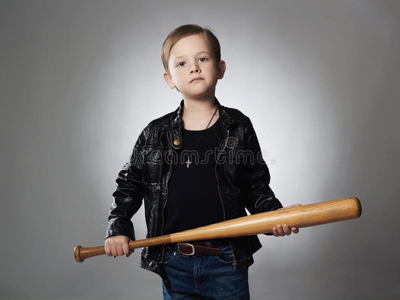 Little boy with baseball bat.Funny child in leather coat.thug stock images Little boy with baseball bat.Funny child in leather coat.thug stock images