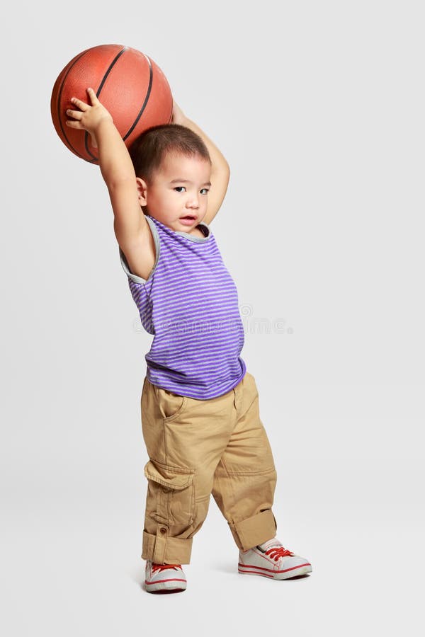 Little boy with basketball stock image. Image of funny 37385427