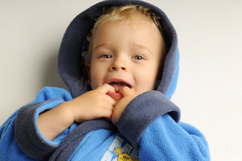 Little boy in bath robe stock photo. Image of blonde 16928850