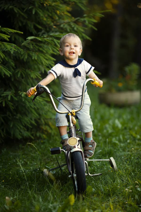 Little boy with bicycle stock image. Image of outdoors 32931967