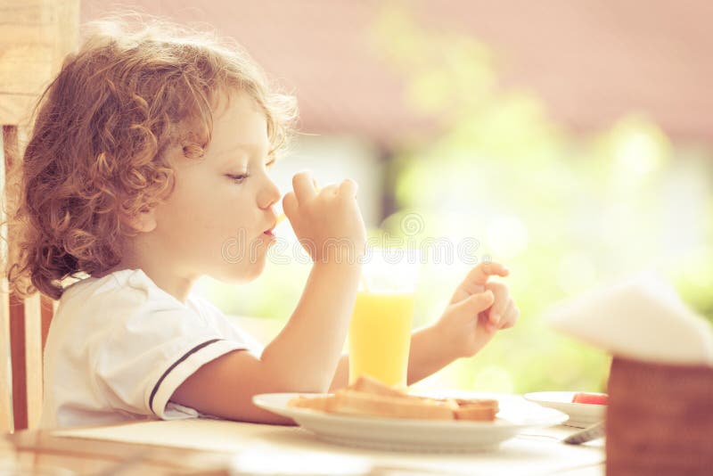 Little boy at breakfast