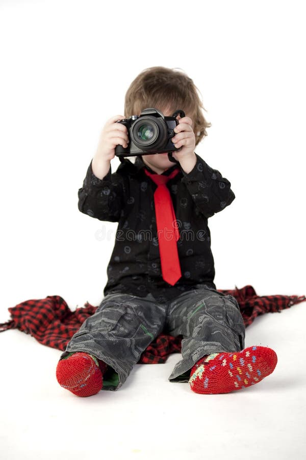 Little boy with camera