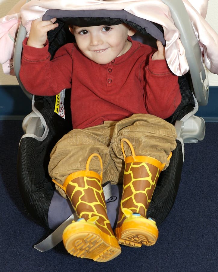 Little boy in car seat stock image. Image of pleasant 4534267