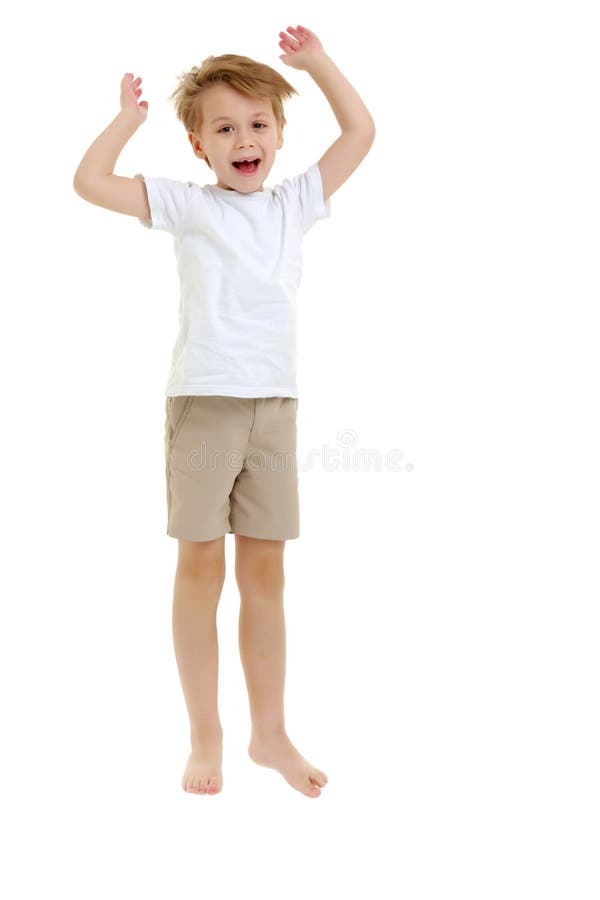 A Little Boy in a Clean White T-shirt is Jumping Fun. Stock Image ...