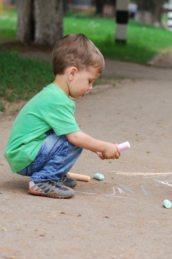 Little Boy Drawing with Chalk Stock Image - Image of infant, male: 14989627