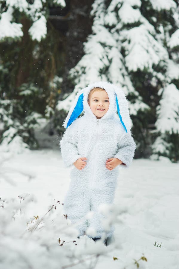 a little boy dressed as rabbit meets new year