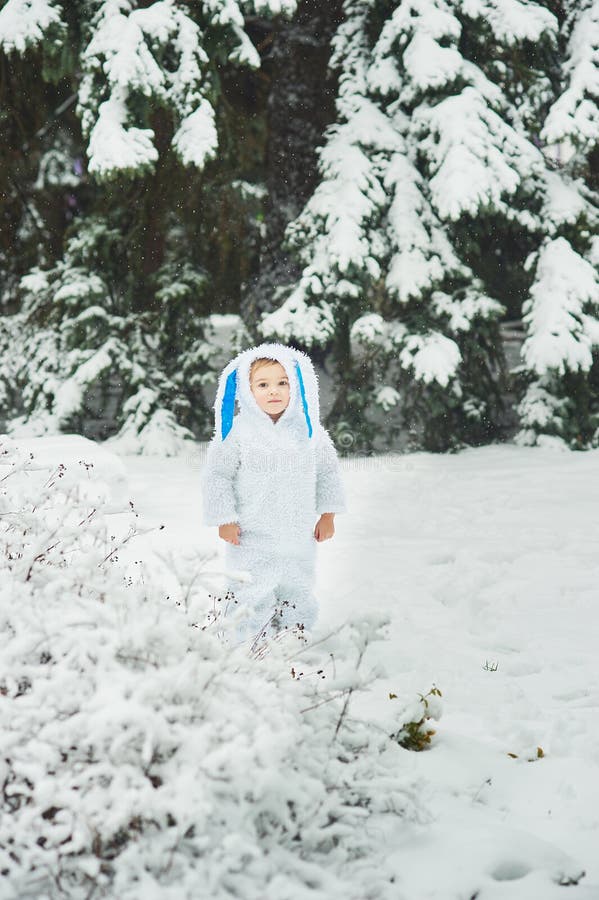 a little boy dressed as rabbit meets new year