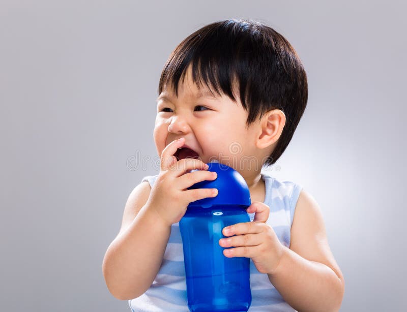 Little boy drinking water stock photo. Image of hand 41167014