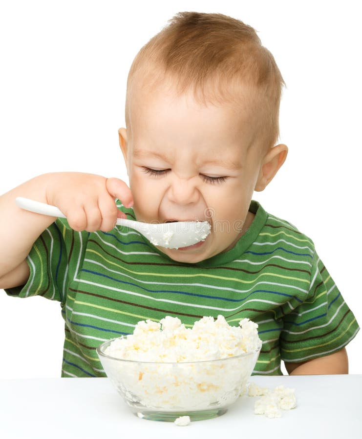 Little Boy is Eating Cottage Cheese Using Spoon Stock Image Image of