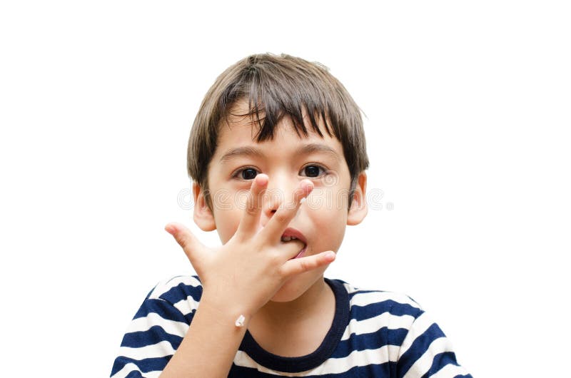 Little boy eating rice happy face