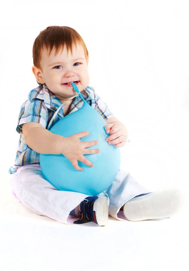 Little boy eats blue baloon