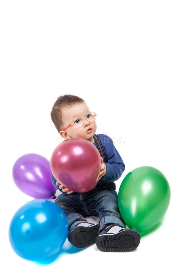 Little Boy with Eyeglasses Playing with Colorful Balloons Stock Image ...