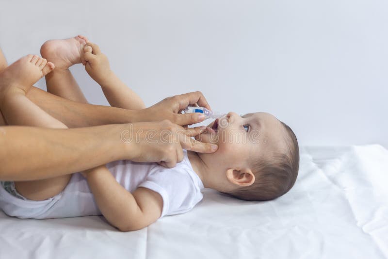 Infant Getting Breathing Treatment From Mother Stock Image ...