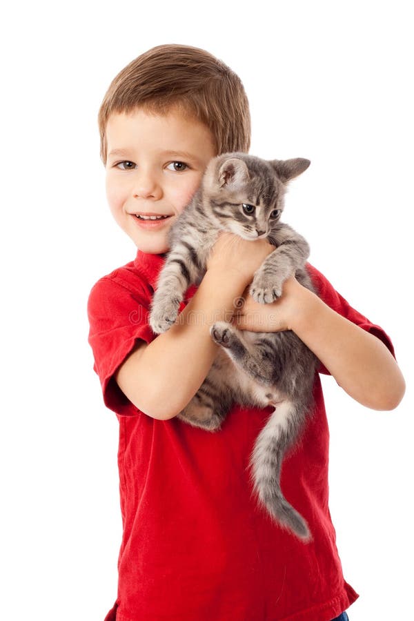 Little boy with gray kitty in hands